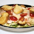 Caesar salad with fresh salmon
